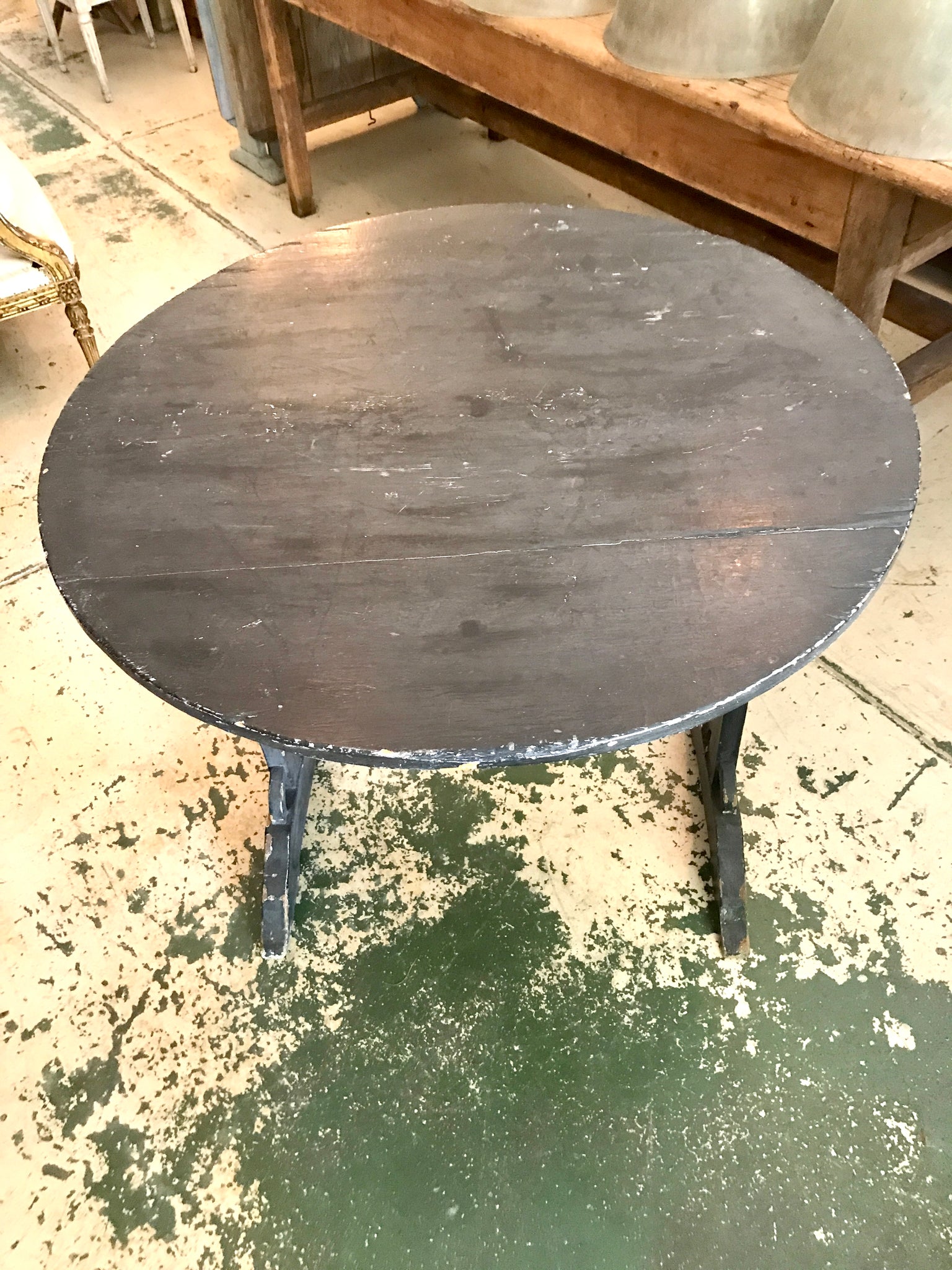 Antique French tilt top wine table