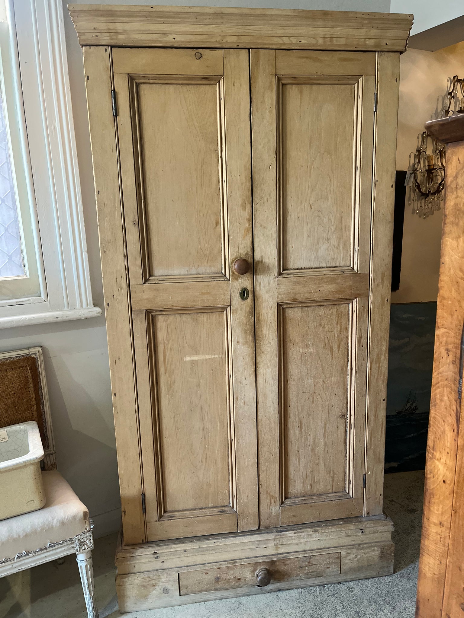 Antique European pine cupboard