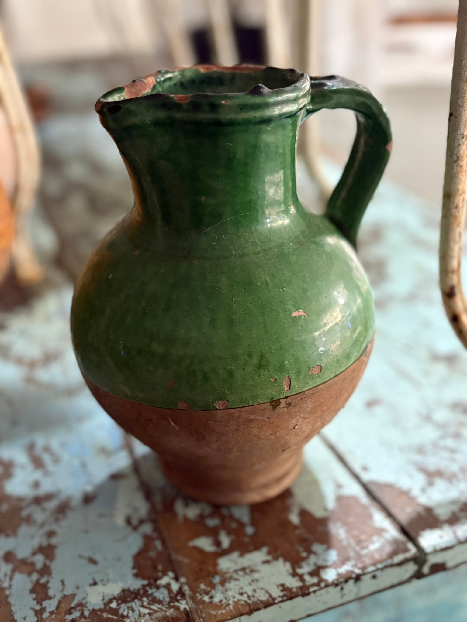 Antique green glaze jug