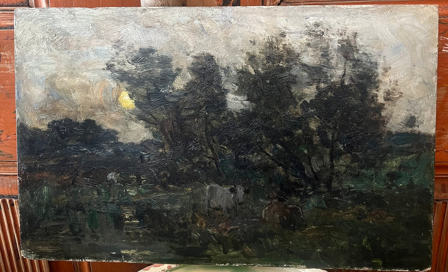 Antique landscape oil on board, with cows