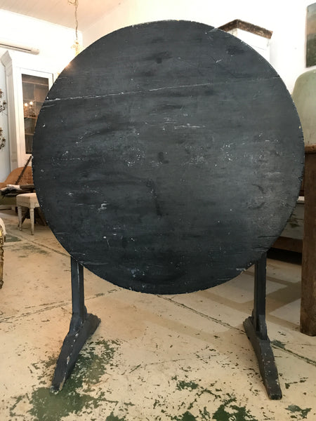 Antique French tilt top wine table